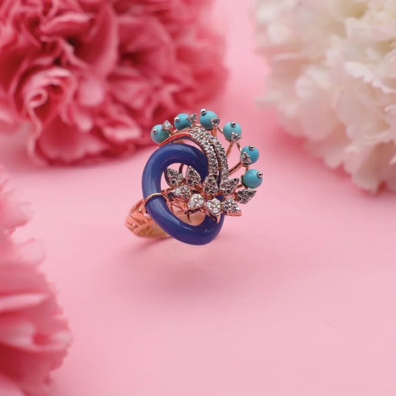 Blue Stone Rose Gold Designer Ring with Diamond Detailing