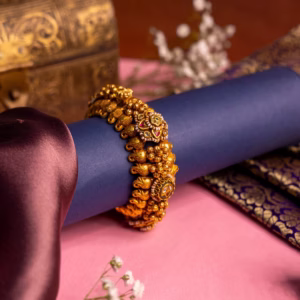 Antique Gold Kada with Elephant Row and Ruby Kundan
