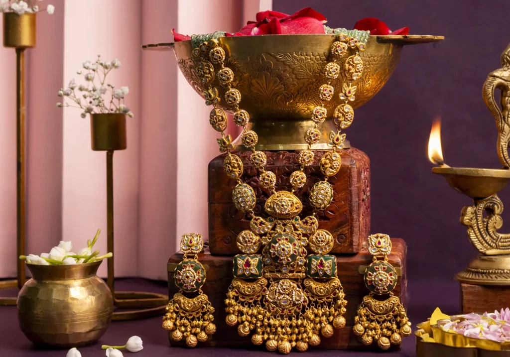 Heavy bridal gold haars displayed with brass lamps